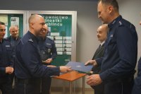 asp. szt. Z. Domagałę żegna insp. R. Rabsztyn