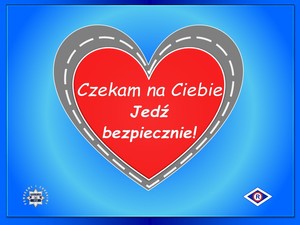 Na zdjęciu czerwone serce z białym napisem &quot;Czekam na Ciebie-jedź bezpiecznie!&quot;