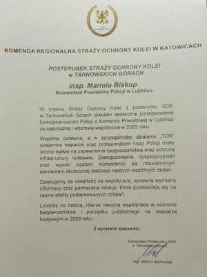 na zdjęciu jest widoczny list gratulacyjny od Komendy Regionalnej Straży Ochrony Kolei w Katowicach  Posterunek Straży ochrony Kolei w Tarnowskich górach. W piśmie zawarte są podziękowania za wspólna współpracę oraz wyrażona chęć dalszych wspólnych  działań